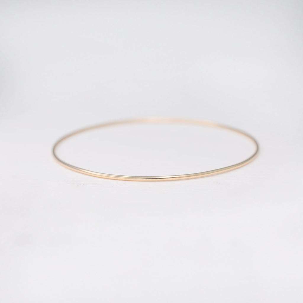 Minimalist handmade 14k solid gold stacking bangle