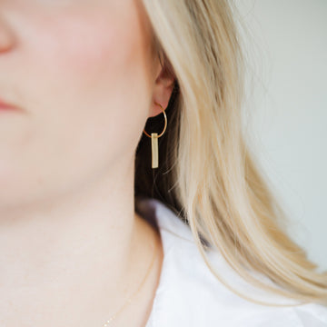 Minimalist handmade 14K solid gold hoop earring with flat bar