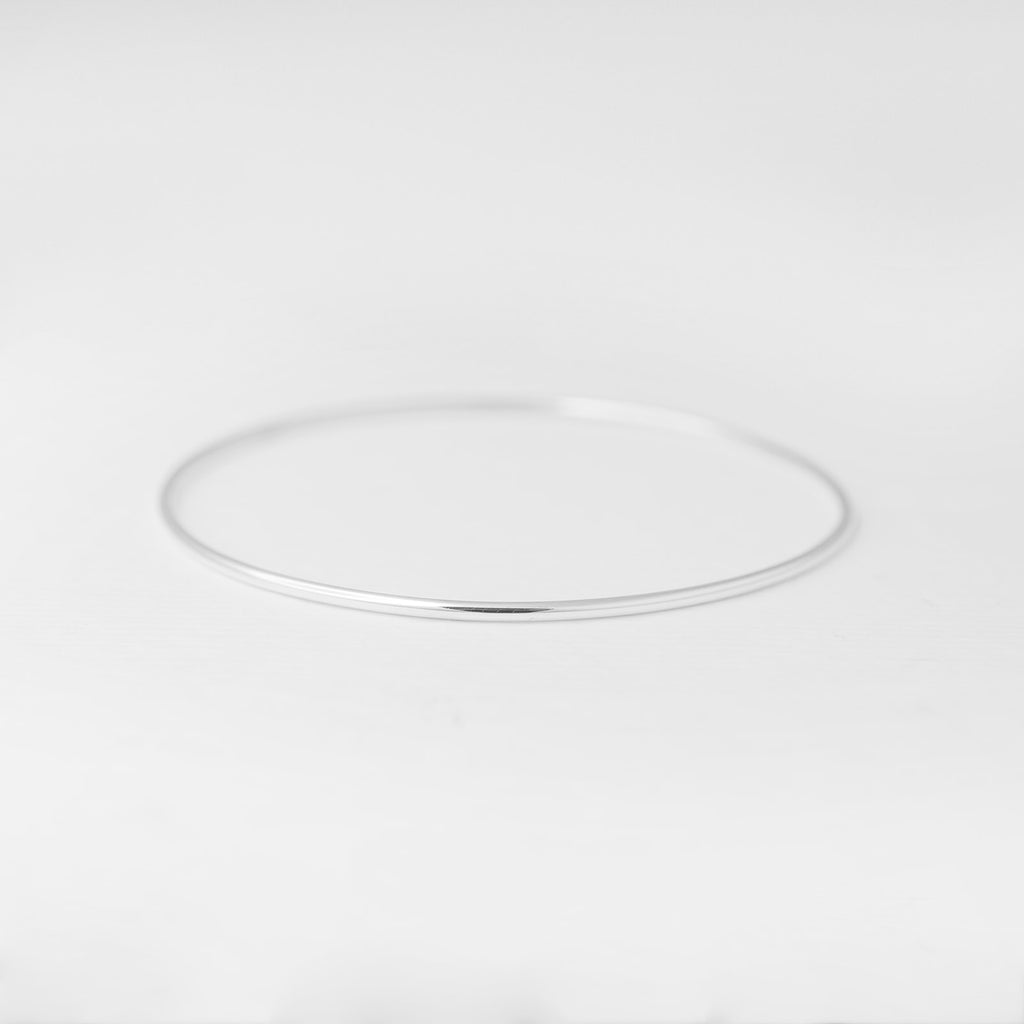 Minimalist handmade sterling silver smooth stacking bangle