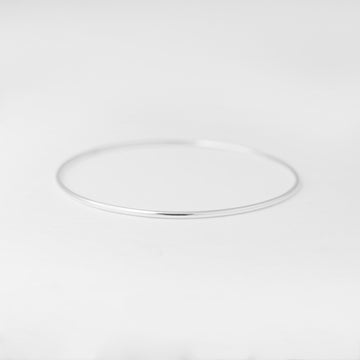 Minimalist handmade sterling silver smooth stacking bangle